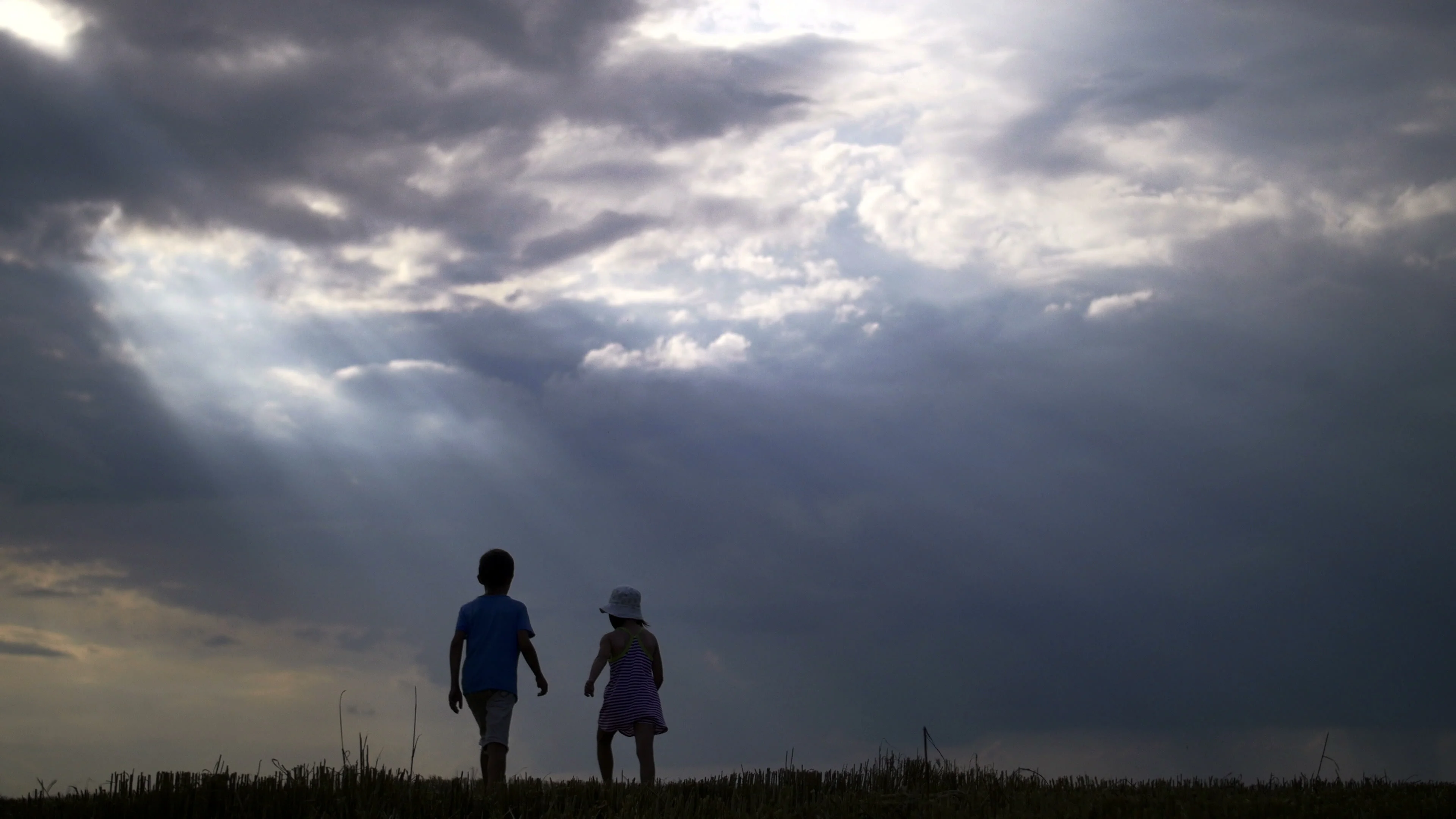 Silhouette Boy With Girl Holding Hands A Stock Video Pond5