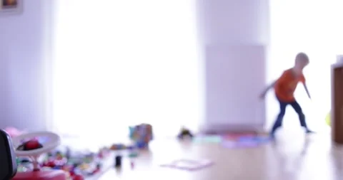 Silhouette of a boy playing in a room Stock Footage 270462689