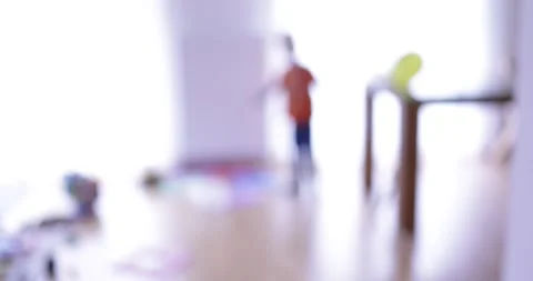 Silhouette of a boy playing in a room Stock Footage 270462910