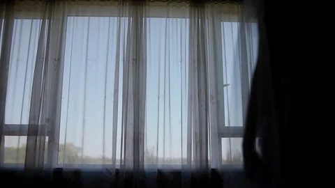 Silhouette of the bride coming to the window Stock Footage 100196790