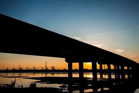 The silhouette of the bridge Stock Photos