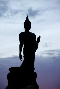 Silhouette of buddha statue Stock Photos