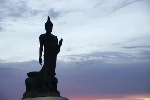 Silhouette of buddha statue Stock Photos
