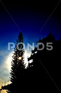 Silhouette of Buddhist Temple Stock Photos