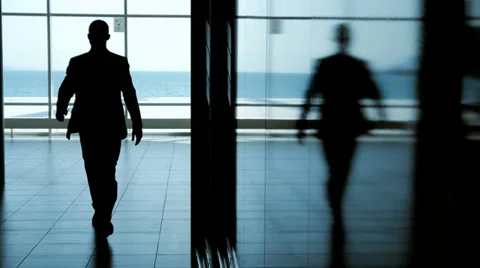 Silhouette of business man walking. male person people Stock Footage