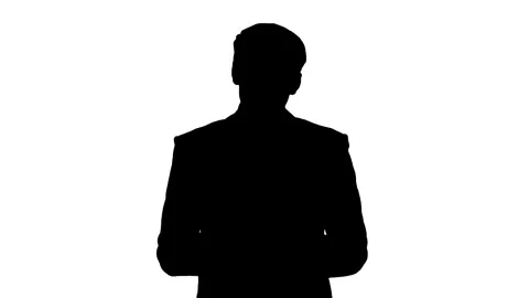 Silhouette of businessman explaining concept on white background. Stock Footage 340084331