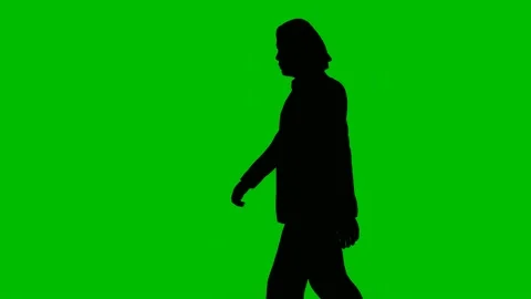 Silhouette businessman walking on green ... | Stock Video | Pond5