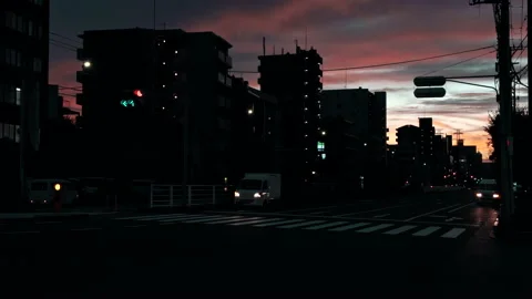 Silhouette of busy intersection in sub urban area of Japan with colorful sky Video stock 219333193