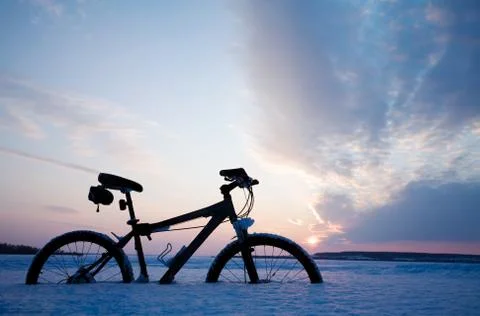 Silhouette of bycycle Stock Photos