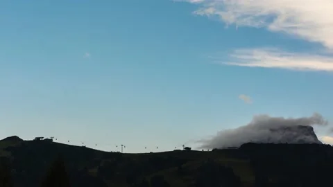 Silhouette of a Cable Car Line on a Mountain Ridge Stock Footage 146332686
