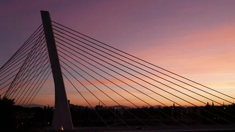 Silhouette of the cable-stayed Millennium bridge in Podgorica at sunset. Stock Footage 124099931