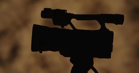 Silhouette of a Camera with Artistic Background Stock Photos