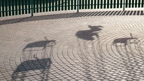 Silhouette of carousel in sun rays. Stock Footage 264511873