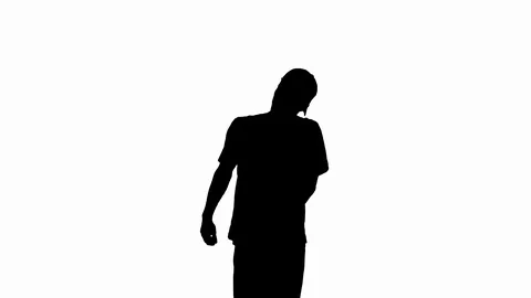Silhouette Caucasian man rapper does some stylish light dancing. Video stock 114670007