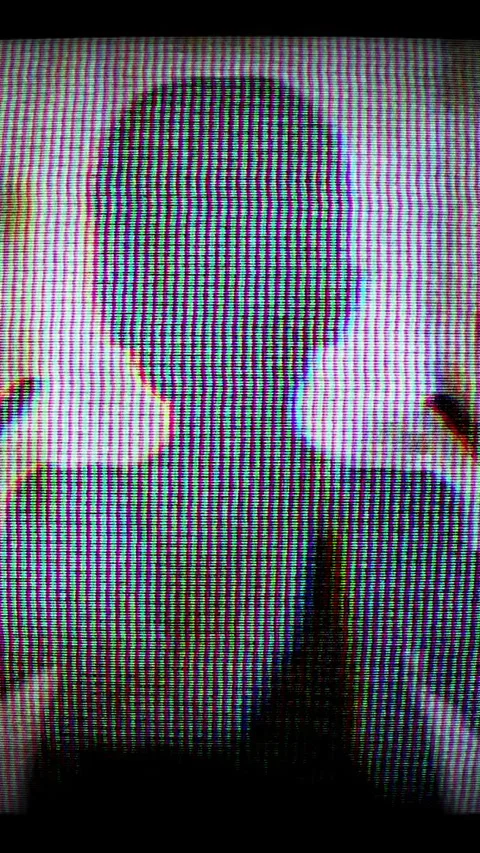Silhouette of Child Behind Screen With White Mask Creates Mystery And Fear .. Stock Footage 329514643