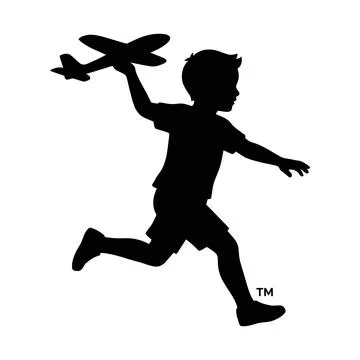 Silhouette of a child running while flying a model airplane in the sky Illustrazione stock