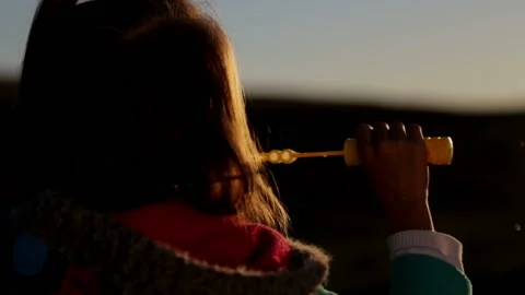 Silhouette of a child with soap bubbles. Stock Footage 96214085