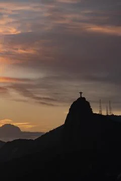 Silhouette Christ the Redeemer on top of the mountain Stock Photos