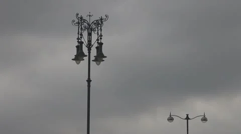 Silhouette of city lantern among clouds Stock Footage 10838359