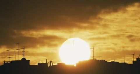 Silhouette of the city at sunset Stock Footage 228511346
