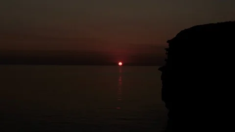 Silhouette of cliffs at Sunset Stock Footage 113157622