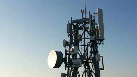 Silhouette of a communication tower for 5G network Video stock 144080422