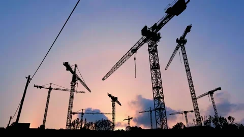Silhouette of a Construction Crane in Action Stock Footage 238828936