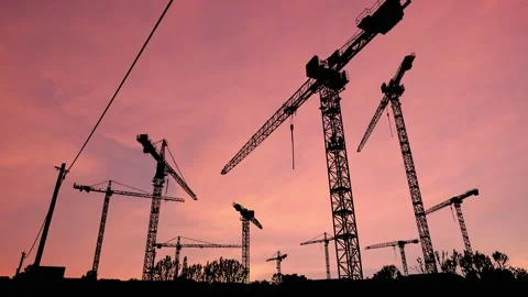 Silhouette of a Construction Crane in Action Stock Footage 238868965