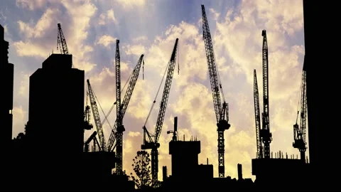 Silhouette of a Construction Crane in Action Stock Footage 239882035