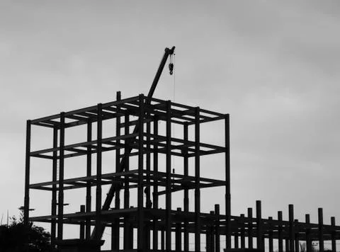 SILHOUETTE CONSTRUCTION CRANE Stock Photos