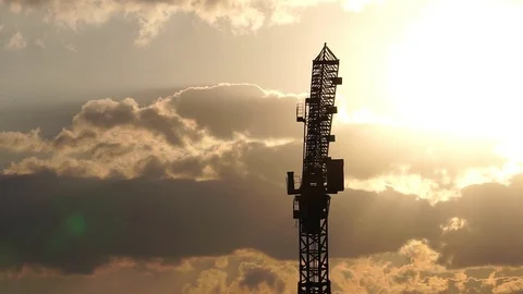 Silhouette of construction cranes. Background clouds the sunset  Stock Footage 122443735