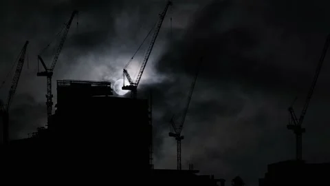 Silhouette of a Construction Site with aBig Tower CraneUnder Construction 스톡 동영상 239760412