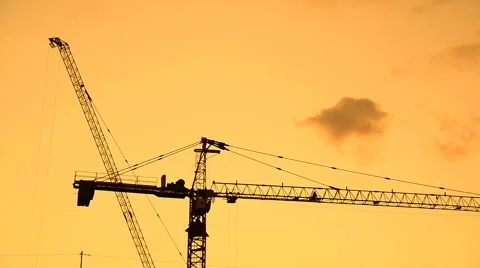 Silhouette of construction site in sunset sky. Stock Footage 47735701