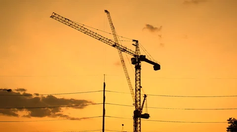 Silhouette of construction site in sunset sky. Stock Footage 47736420