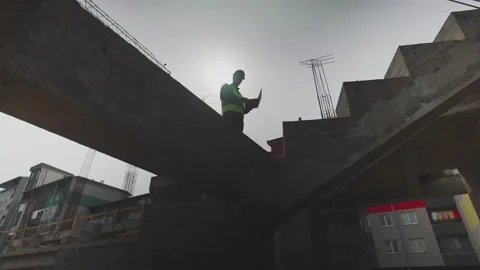 Silhouette of a Construction Site Worker Stock Footage 150890260