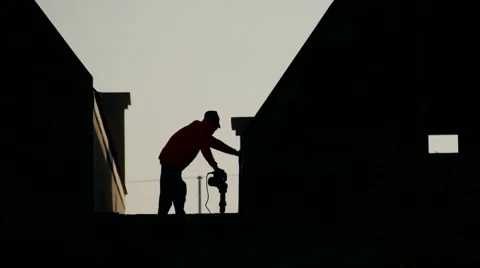 The silhouette of a construction worker. Stock Footage 50628748