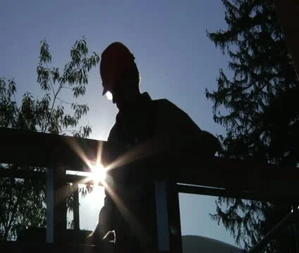 Silhouette of a construction worker in hardhat Stock Footage 21560146