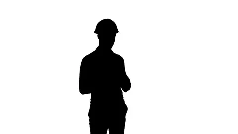 Silhouette Construction worker using phone to take selfies Vidéo 73620249