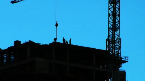 Silhouette of construction workers  Stock Footage 722540