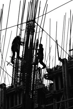 Silhouette of Construction Workers Stock Photos