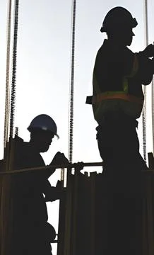 Silhouette of construction workers 写真素材