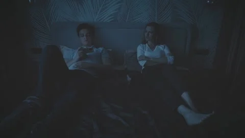 Silhouette couple in bed family problem. Sad upset lonely woman wife offended Stock Footage 312262237