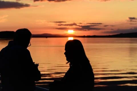 Silhouette of a couple Stock Photos