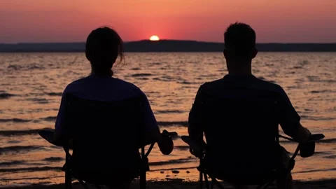 Silhouette of a couple on the shore. Stock Footage 247492271