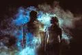 The silhouette of couple in the smoke Photo