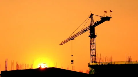 Silhouette crane working in construction site and sunset Stock Footage 47721827