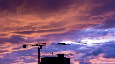 Silhouette Crane Working In Construction Site And Twilight Sky (zoom in) Stock Footage 51936624