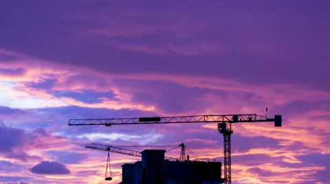 Silhouette Crane Working In Construction Site And Twilight Sky (zoom out) Stock Footage 51944232