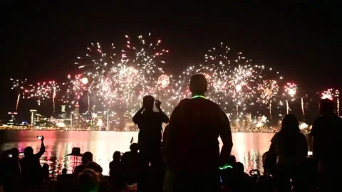 Silhouette of crowd watching Firework show on Australia Day in Perth Western  Stock Footage 154974918