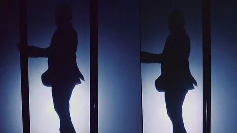 Silhouette of a dancer that resembles Michael Jackson Stock Footage 101441594